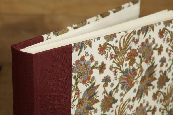 Notebook unlined, hard cover Florentine style with gold, linen spine bordeaux